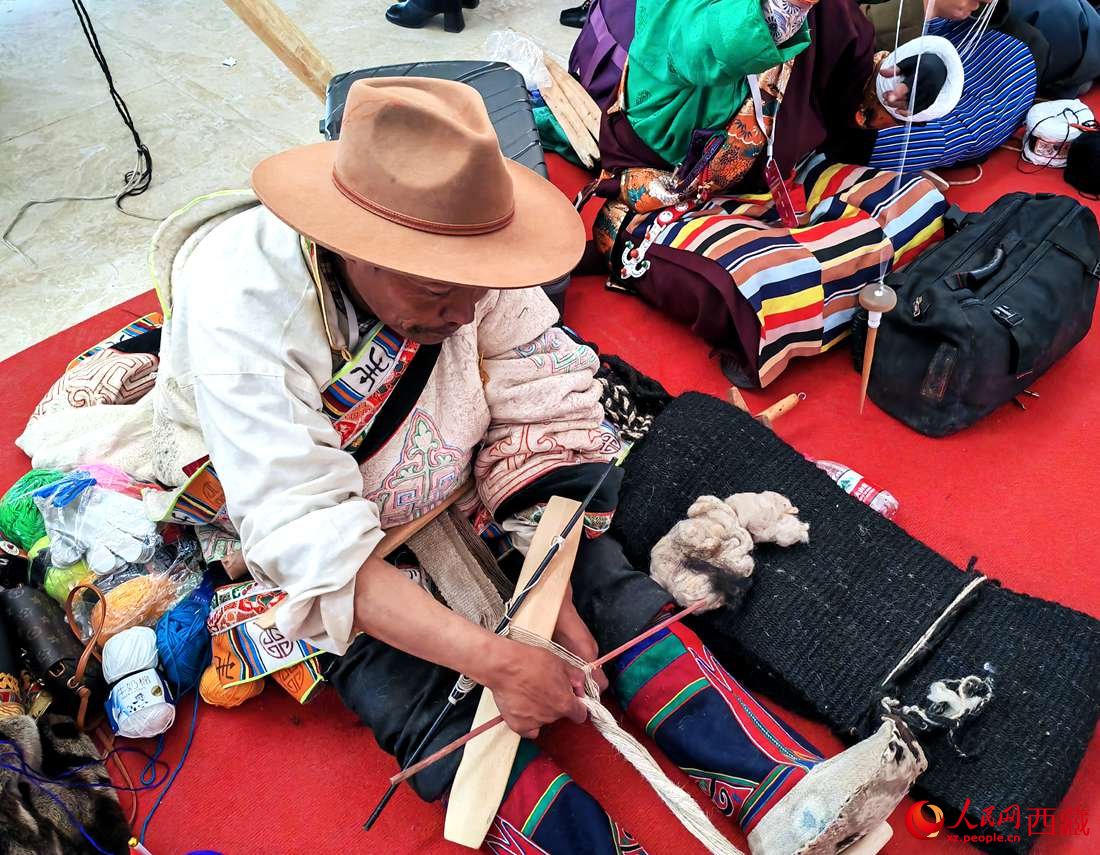 編織技能展示。人民網 李海霞攝